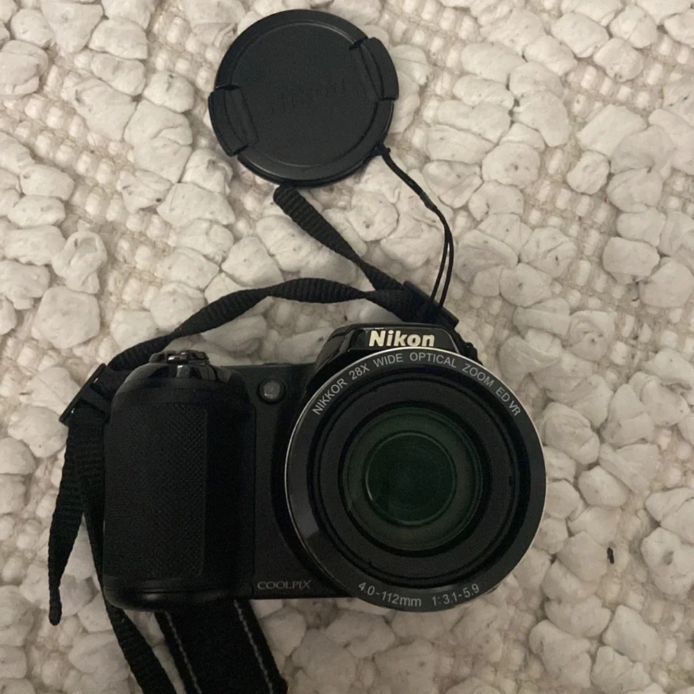 Black Nikon coolpix digital camera